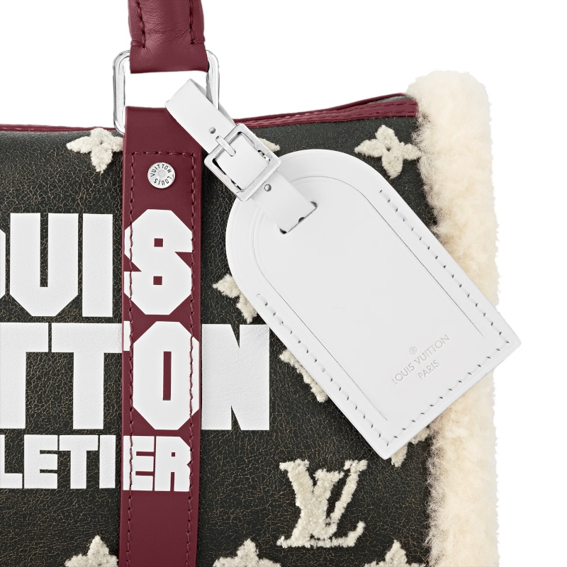 Сумка Keepall 25 с плечевым ремнём с логотипом и отделкой из овчины